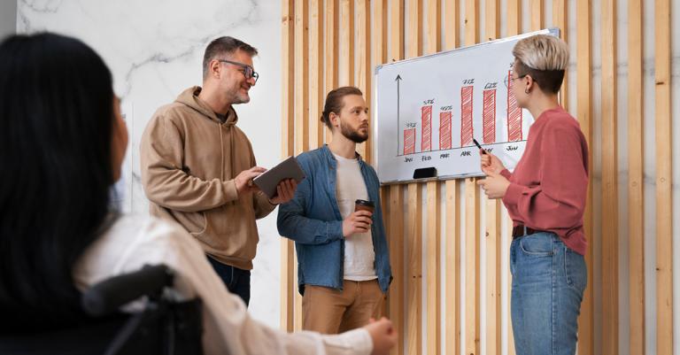 3 Personen bei einer Workshop-Situation