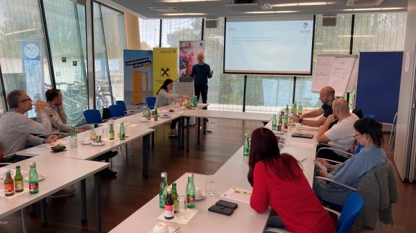 Vortragssituation mit Kleingruppe
