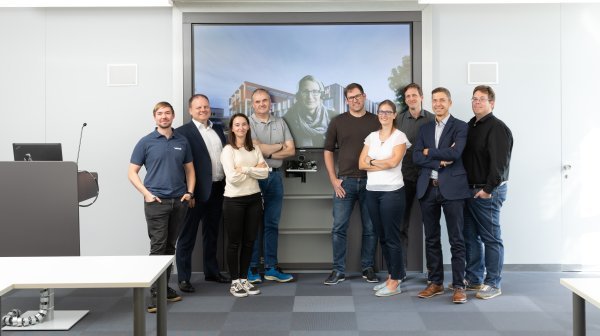 Gruppenfoto in Vortragsraum